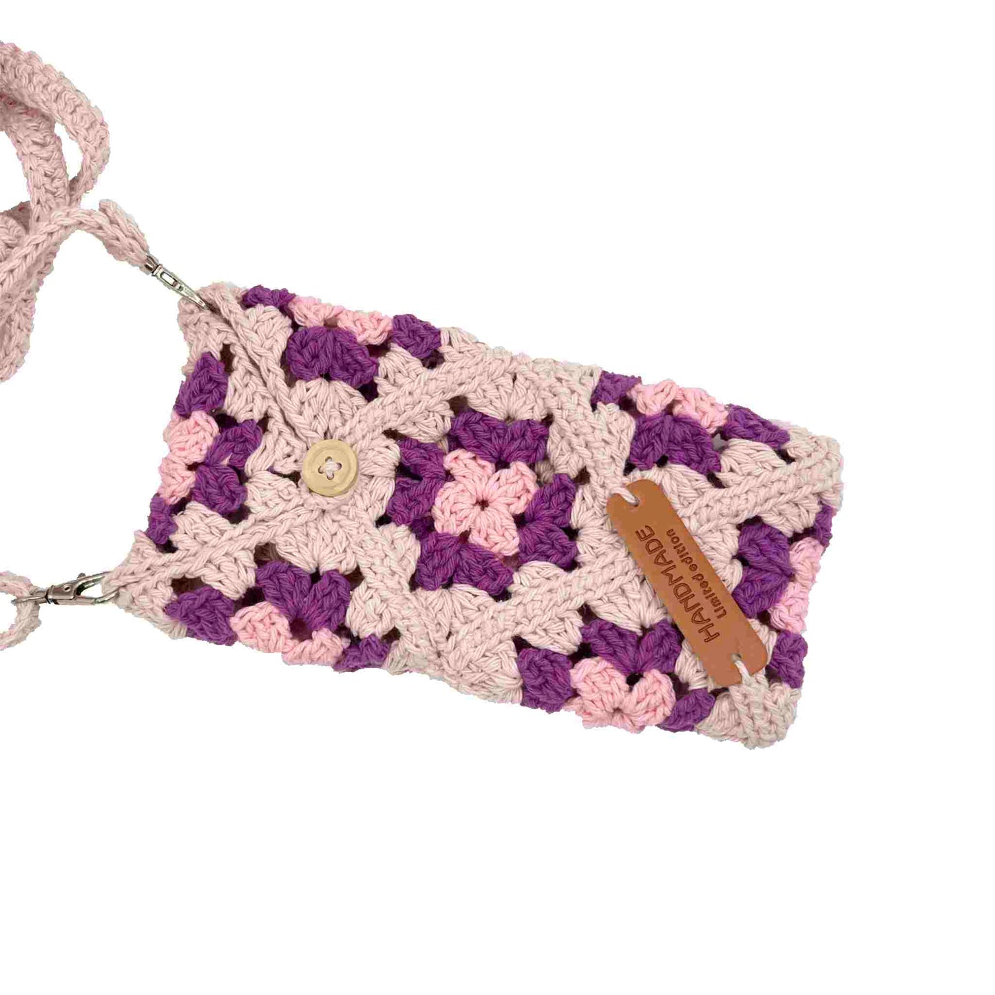 Funda de móvil a crochet lila para colgar.
